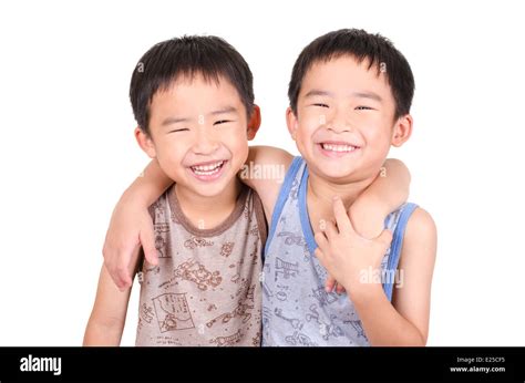 Cute Twins Smiling Stock Photo Alamy