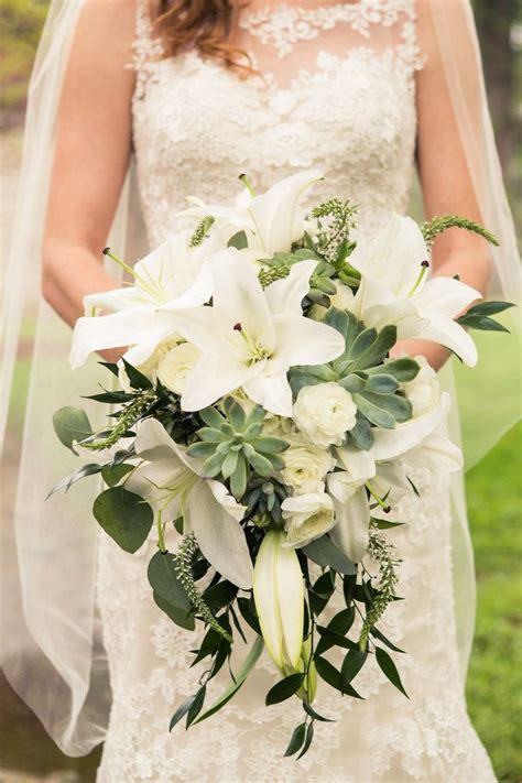 my bridal cascade bouquet using casablanca lilies and succulents lily bouquet wedding