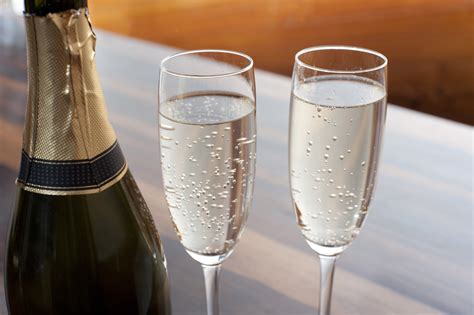 Two Elegant Flutes Of Sparkling Champagne Free Stock Image