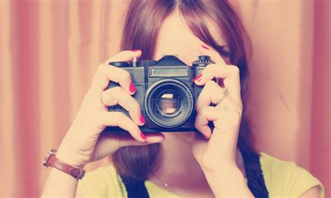 Girl Holding Vintage Photo Slr Camera In Front Of Her Face Stock Image Image Of Females