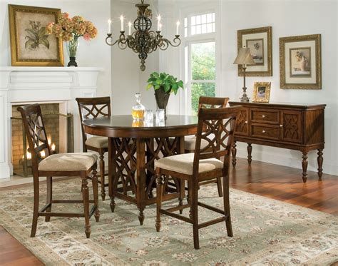 Dining room tables by ashley furniture homestore. Woodmont Brown Cherry Round Counter Height Dining Room Set ...
