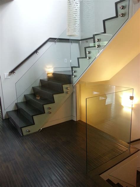 Nowadays, designers are pivoting towards a open concept sleek custom stairs and railings design to compliment their living spaces. Glass Stair Railings | Artistic Stairs Canada