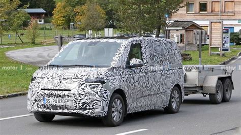 Volkswagen's little minivan returns for another generation, with diesel, gasoline and hybrid models expected. VW Transporter T7 Spied Wearing Production Body Panels ...