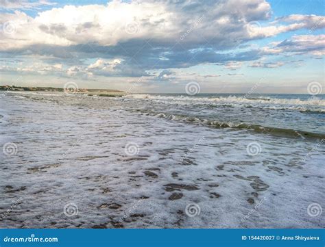 Beautiful Bright Blue Seascape Sky Clouds Water Waves Sand Wind