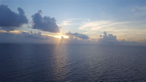Sunrise Breaking Through The Clouds Over The Caribbean Sea Caribbean