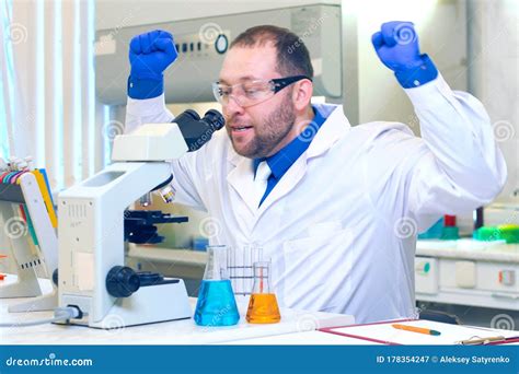 Chemist A Scientist Conducts Experiments In A Scientific Labora Stock