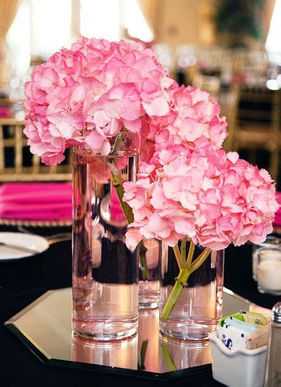 Dining table flower arrangements in vases vases are the most commonly used vessels for arranging flowers on tables. flower arrangements for rehearsal dinner tables | Flower ...