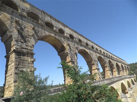 The Pont Du Gard Is An Ancient Roman Aqueduct Bridge That Crosses The