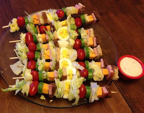 You're going to need this list of easy no cook appetizers next time you're asked to bring something to a party. Salad-on-a-stick with ranch | Appetizer recipes, Skewer recipes, Yummy lunches