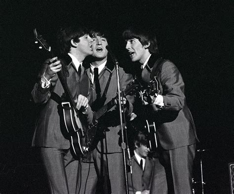 The Beatles 1964 Us Tour L R Paul Photograph By Popperfoto