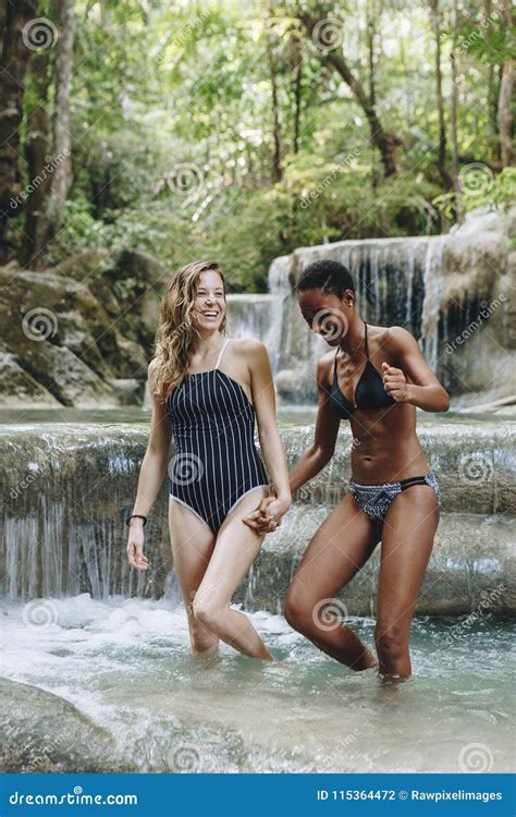 Diverse Women Couple Enjoying The Waterfall Stock Photo Image Of Friends Lifestyle