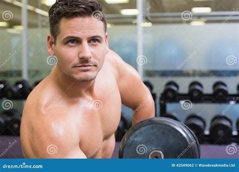 Handsome Bodybuilder Lifting Heavy Dumbbell Stock Photo Image Of Side