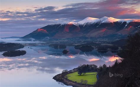 Sun Rising Over Skiddaw Mountain And Derwentwater In Cumbria England