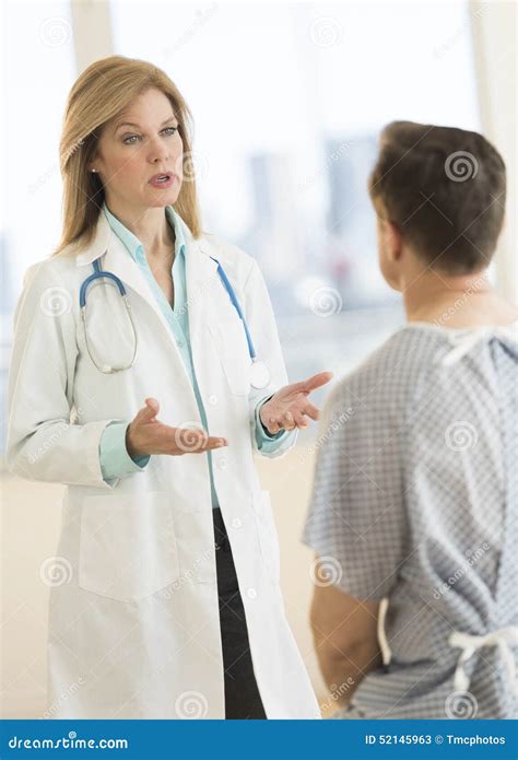 Female Doctor Discussing With Patient In Hospital Stock Image Image