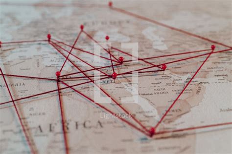Push Pins And String On A World Map — Photo — Lightstock