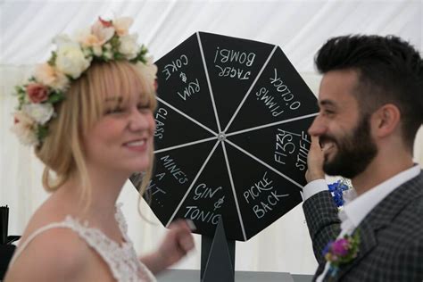 Let loose and play a friendly game of catch with guests of every age. 24 Entertaining Wedding Reception Games - EverAfterGuide