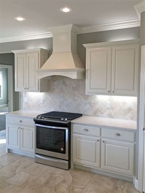 White Kitchen With Satin Nickel Fixtures Pendant Lights Travertine