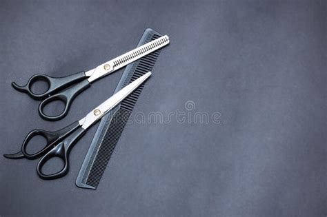Hairdressing Scissors And Comb On Gray Background Stock Photo Image