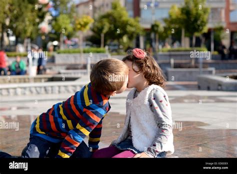 Little Boy 6 7 And Girl 4 5 Kissing Stock Photo Alamy