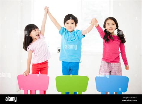 Child Raising Hand Hi Res Stock Photography And Images Alamy