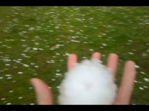 Some of the best footage i've ever seen of hail! Very large hail storm...baseball sized hail! - YouTube