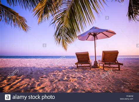 Beautiful Tropical Sunset Scenery Two Sun Beds Loungers