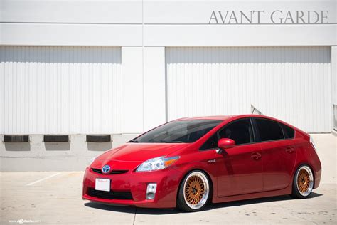 Red Toyota Prius Gets Upgraded Lighting And Bronze Avant Garde Wheels
