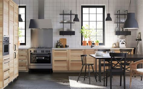 Much do stainless steel kitchen cabinets cost. A large kitchen in ash with black handles and white ...