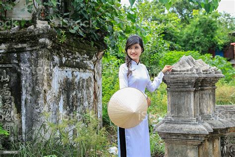 Beautiful Vietnamese Girl In Traditional Long Dress Or Ao Dai Stock