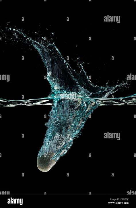 Stone Dropping Into Water Stock Photo Alamy