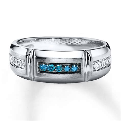 Our diamond wedding bands are crafted with the utmost care and attention to provide you with a superior product that truly expresses how you feel about your partner. Kay - Men's Wedding Band 1/4 ct tw Blue Diamonds 10K White Gold