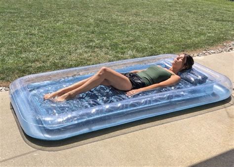 This Inflatable Sunbathing Pool Lounger Doubles As A Mini Pool