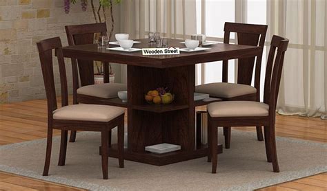 They are definitely a fine choice to go with if you are looking for something that is simple yet depending on the size of your dining area, you can choose a shape that fits the space perfectly. Buy Ralph 4 Seater Dining Set with Storage (Walnut Finish ...