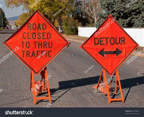 Temporary Signs Use Detour Because Road Stock Photo