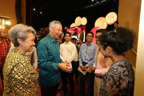 Prime Minister Lee Hsien Loong Interacting With Young Malay