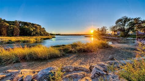 River Between Green Grass Trees And Sand Rocks Hd Sunset Wallpapers