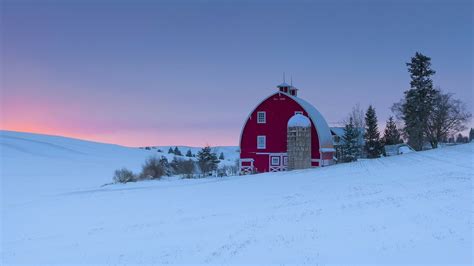 Barn And Silo In Winter Sunset