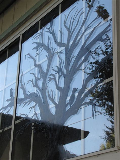 This post contains affiliate links. DIY Halloween Window Painting | The Abundant Wife
