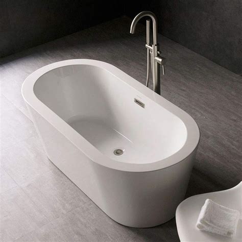 Standard bathtub dimensions & minimum requirements. Standard Bathtub Size & Style | Bathtub sizes, Bathtub ...