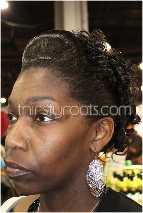 Relaxed Hair Updo With French Roll And Curls