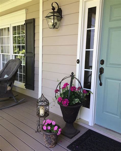 The best paint colours for your front door. Front door: Mermaid Net by Behr; Siding: Pewterworks by ...
