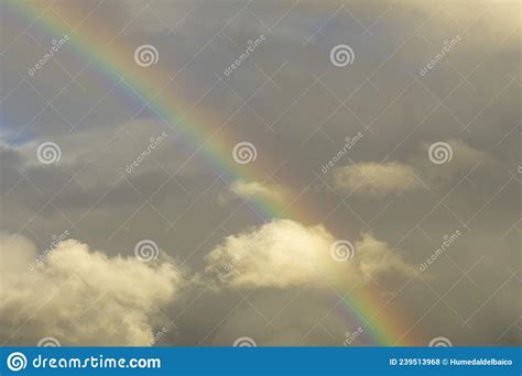 Rainbow Over A Cloudy Sky Stock Photo Image Of Climate 239513968