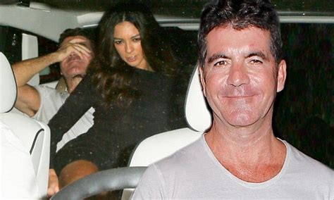 Simon Cowells Ex Sits On His Lap As He Celebrates Birthday Without