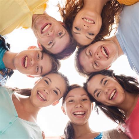 Group Of Smiling Teenagers Stock Photo By ©sydaproductions 62812007