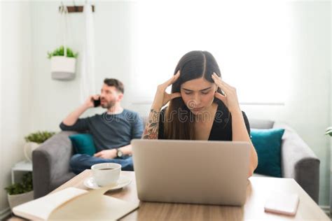 Upset Girlfriend Suffering While Working From Home Stock Photo Image