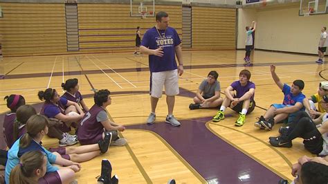 Yotes Basketball Team Helps Disadvantaged Kids