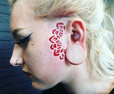 Pin On Scarification Tattoo