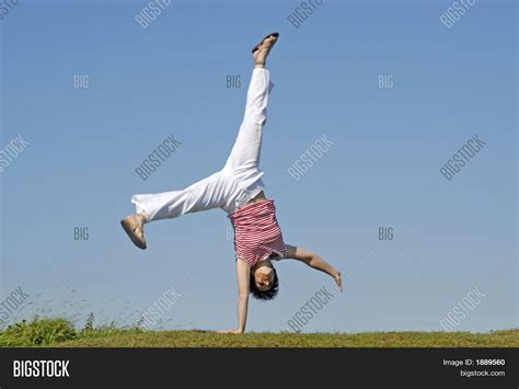 Adult Woman Doing Cartwheel Image And Photo Bigstock