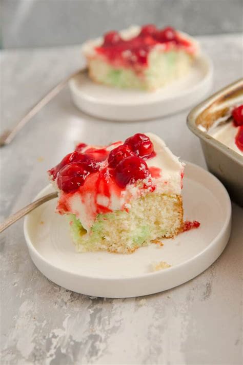 Poke holes in a white cake, pour fruit flavored gelatin over that. Holiday Jello Poke Cake | Lemons for Lulu | Bloglovin'