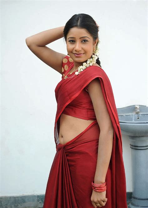 The cultural views of the navel vary significantly. Dressing Below Navel Saree: Reshmi in Hot Navel Saree
